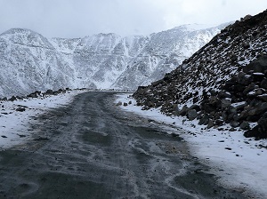 Rough steep snowy - the road to Khardung La Pass, Ladakh India