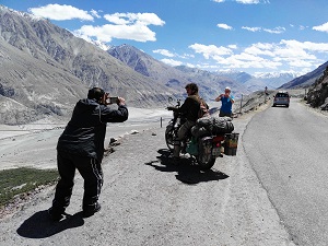 Traveller on the Shyok river roadside