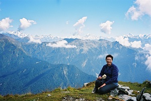 With the high Himalayas as my backdrop I sit above the Chopta Forest and Tungnath temple Indian Himalayas 2003