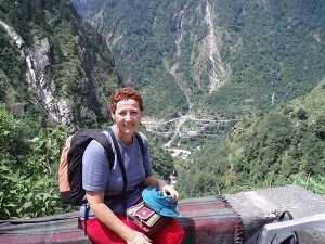 Me sitting on a wall on our return down the valley track - above Govind Ghat - happy that we have been to the Valley Of Flowers and achieved our goal! India 2006