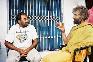 Yogi and Dev having tea and swapping stories, Himalayas, India 2003