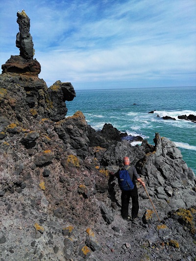 Climbing on the rocks to the lunch spot. Boaz Rock Stack, Banks Peninsula, Canterbury, NZ