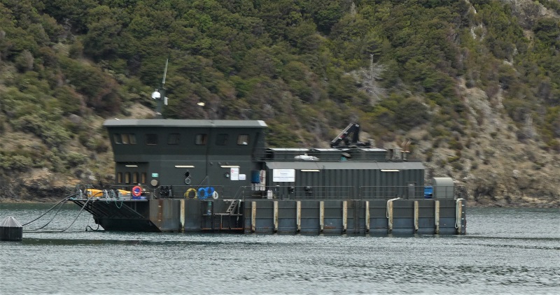 One of the vessels used to store food for the salmon farms