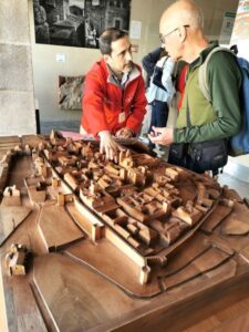 Manfred speaking to a man in the information centre in Cáceres before exploring the old city