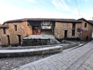 Plaza Juan de Austria historical landmark in Caucos de Yuste with the wall mural