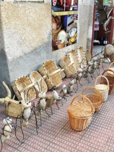 Stone art, metalwork and local baskets at the store across from Hotel Rural Abadia de Yuste