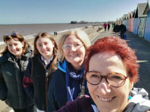 Dionee and my granddaughters with me at Cromer
