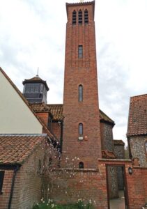 The steeple and complex alleys in the shrine of Mary garden