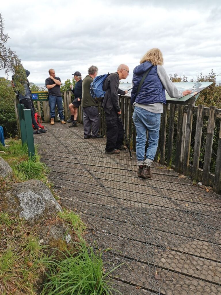 Ackers Point and visitors reading the information boards