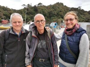 Andy, Manfred and Leonetta back on the Jetty at Golden Bay with the little blue boat in the background