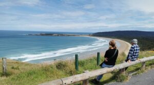 Leonetta and Andy enjoying the sun overlooking Tautuku Bay