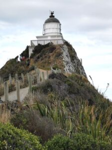 Looking up at the Nugget Point Lighthouse from the last piece of the path