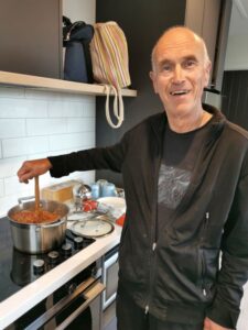 Manfred happy in the kitchen at the Argyle Apartment