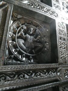 One of the carvings on the ceiling of the small Shiva Temple Hatkoti