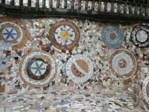 Part of one of the mosaic walls in the ampitheatre in the rock garden Chandigarh