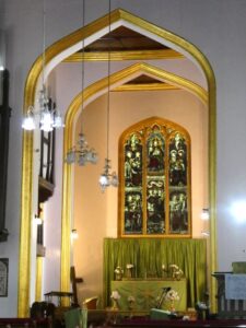 Stunning strained class windows in a side chapel in the Christ Church Shimla