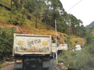Traffic on the road to Sayana Chatti which have been briefly held up by a landslide being cleared