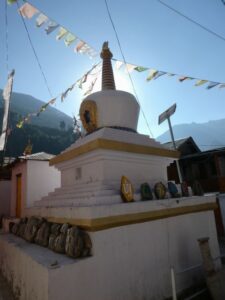 The stupa in Bagori with the sun behind