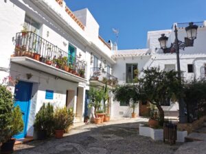 A colourful pot planted corner in Frigiliana near the fountain