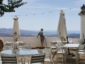 Manfred enjoying the view from the balcony at the hotel in Comares