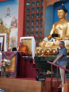Pedro introducing the Buddhist Rinpoche in the Gompa at Karma Guen