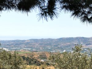 The view across the valley to the South East and the Mediterranean Sea from The Buddhist stupa Karma Guen