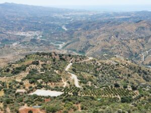 The view from, and the road from Comares to Vélez-Málaga and the Mediterranean Sea