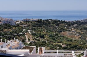 The view from the balcony of the El Adarve Restaurant down to the coast and Nerja on the coast