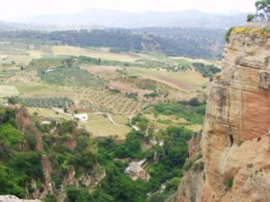The amazing view across the valley from Puente Nuevo Bridge, the olive groves and farms to the hills beyond
