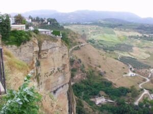 The cliffs near the Puente Nuevo Bridge as seen from Alameda del Tajo Ronda