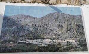 A mosaic photo of Villaluenga del Rosario at the aqueduct fountain and the Navazo cliffs behind