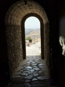 From the inside looking out of the entrance door of the castle on the hill Zahara de la Sierra
