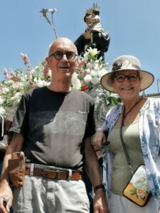 Manfred and Teresa in front of the statue of San Antonio de Padua, El Bosque festival