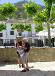 Manfred chatting with a local man beside the Plaza de España Grazalema