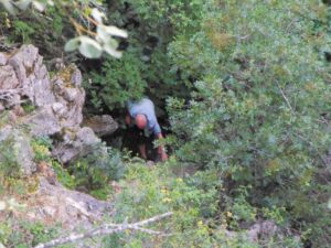Manfred climbing out of the entrance to the Sima del Villaluenga
