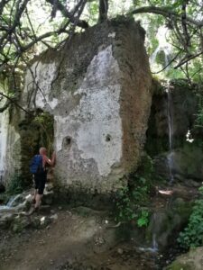 Manfred entering the El Molino del Susto and the little waterfall on the right