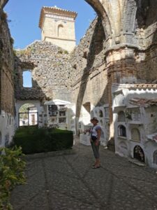 Teresa about to leave the cemetery 'Iglesia del Salvador' (El Salvador Church), Villaluenga del Rosario