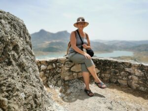 Teresa at a stopping point on the track to the castle on the top of the hill Zahara de la Sierra