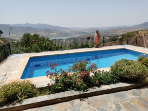 Teresa on the balcony of the pool at El Tajo