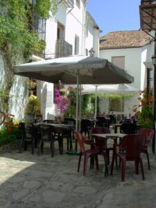 The courtyard tables of the Torreón Cafe & Copas Grazalema