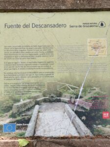The information board at Fuente del Descansadero' (a stone fountain)