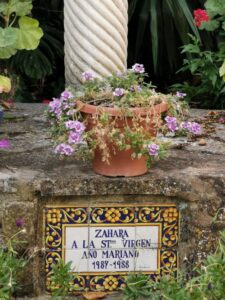 The name at the bottom of the statue beside The Iglesia de Santa Maria de la Mesa (Church of St Mary) Zahara de la Sierra