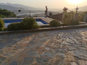 The pool area at El Tajo at sunset