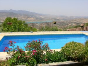 The pool at El Tajo and the view across the embalse towards Zahara de la Sierra