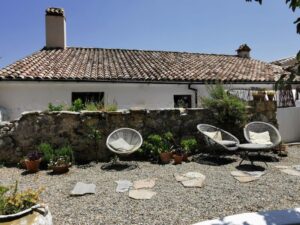 The roof and the swimming pool patio at the 'Mountain Guest House', Casa De Los Cuadros, Villaluenga del Rosario