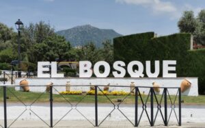 The sign for El Bosque at the entrance to the town