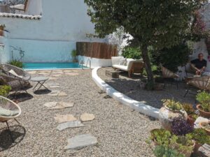 The swimming pool pation at 'Mountain Guest House', Casa De Los Cuadros, Villaluenga del Rosario