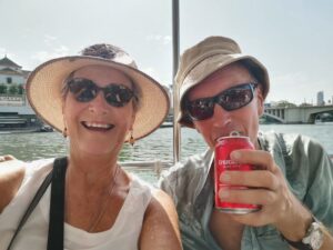 On the river boat cruise enjoying a Cruz Campo beer