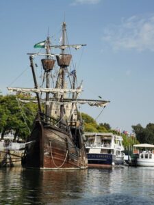 The replica Galion and other boats on the river Seville