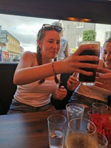 Francesca happy with her first taste of Guinness on Irish soil